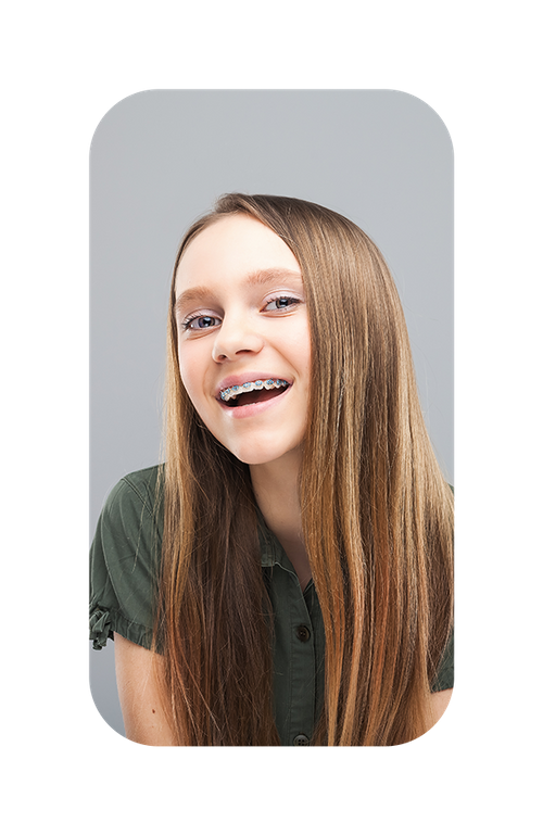 A photo of how happy you can be with color braces from the best orthodontist in Independence, Missouri.
